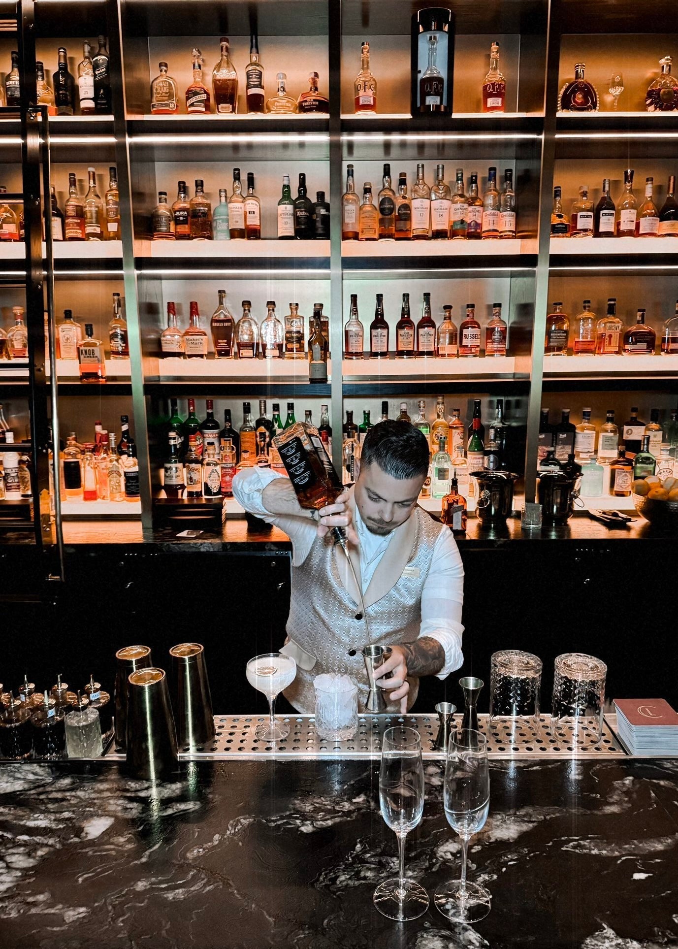 bartender uniforms for hotel casino and restaurants. Custom design and performance fabrics with modern fit.
