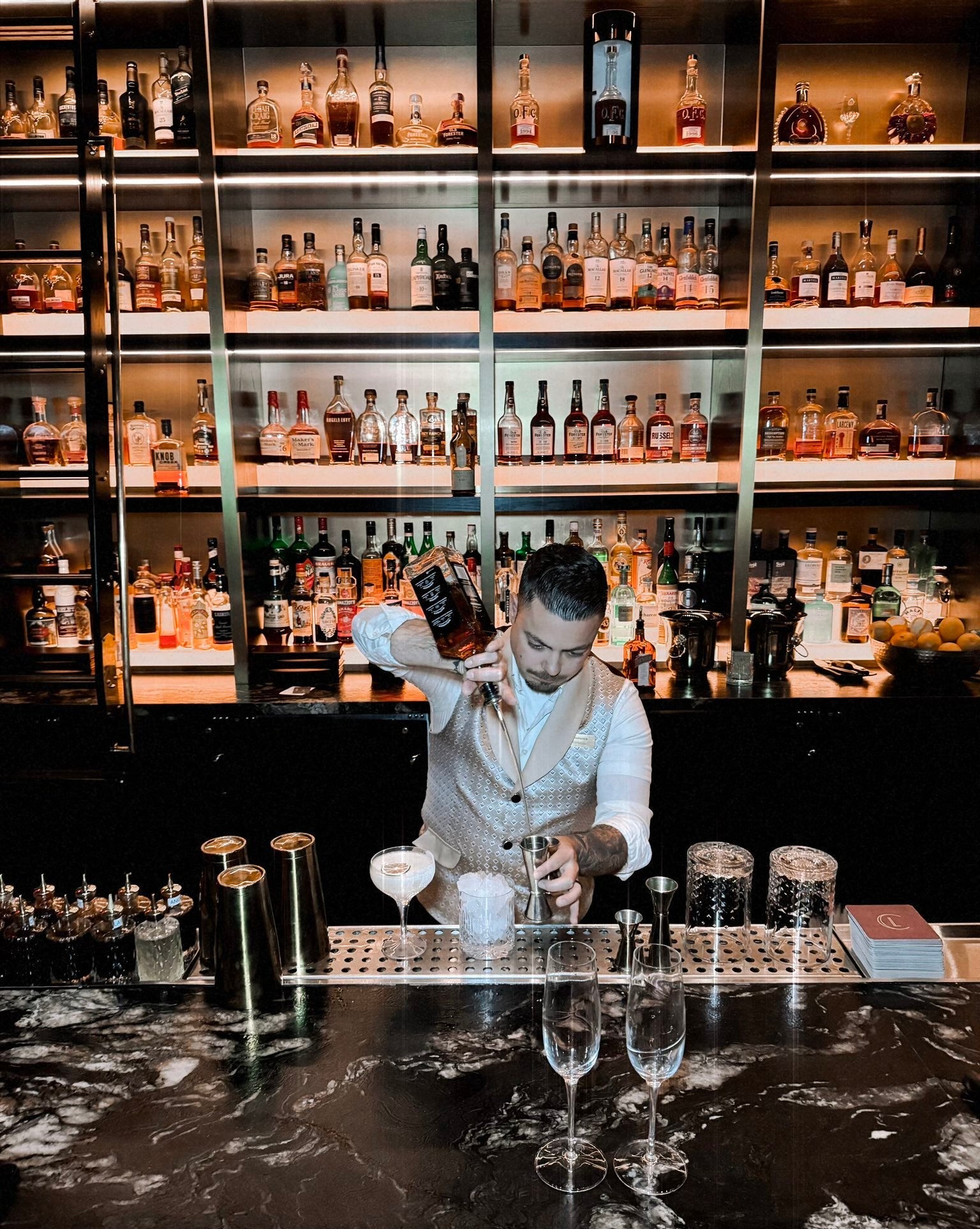 bartender uniforms for hotel casino and restaurants. Custom design and performance fabrics with modern fit.