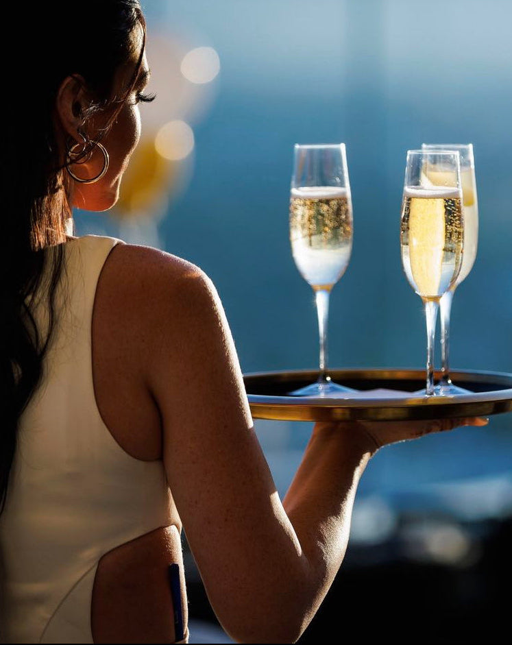 custom cocktail server uniforms designed and manufactured to align with casino hotel and restaurant brands KAPTVA Apparel