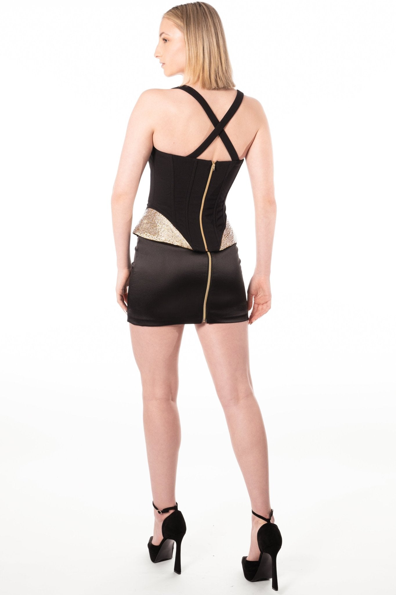 CLAIR Cocktail Skirt Uniform for gaming, casino, restaurant, hotel, hospitality, and resorts. Short satin uniform skirt with gold zipper detail.- KAPTVA Apparel
