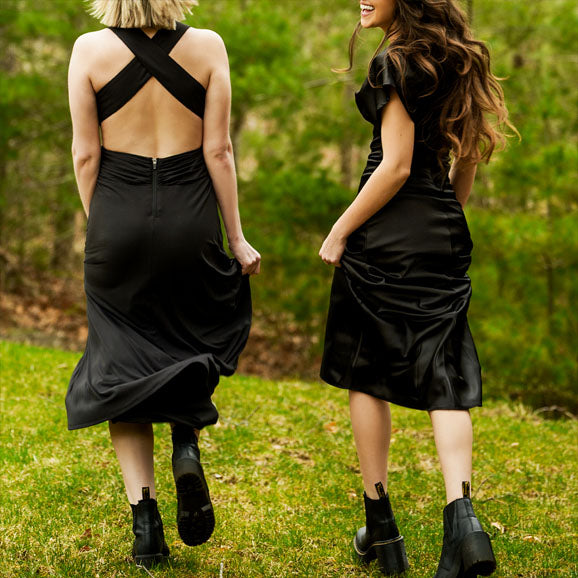 KAPTVA Apparel luxury uniform collection featuring made-to-order cocktail and hostess dresses designed for casino resorts, hotels, and restaurant front-of-house teams.