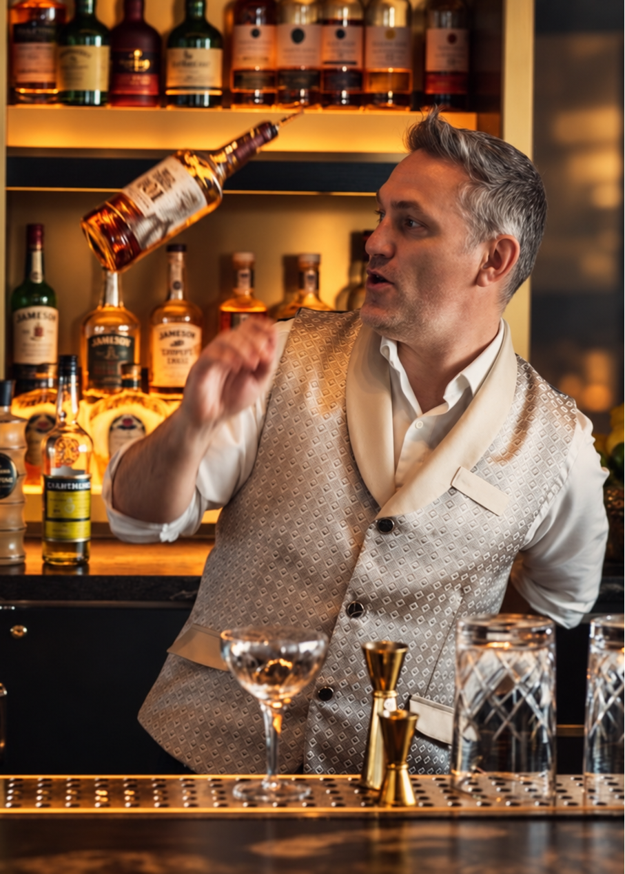 Custom bartender uniforms for bars, casinos, restaurants, and resorts featuring tailored shirts, aprons, and performance fabrics. Uniform design and manufactured in Las Vegas Nevada by Kaptva Apparel