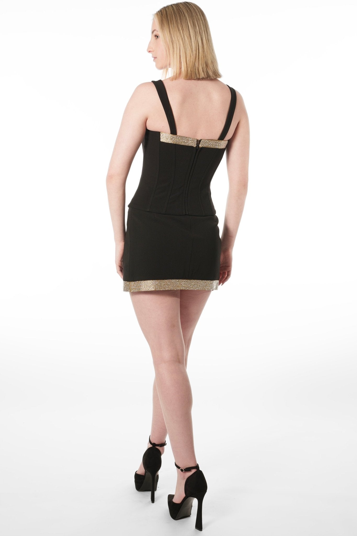 EVIE Bustier Uniform Top for gaming, casino, hotel, restaurants, hospitality, and resorts. Black corset uniform with gold brocade and crystal stone accents. Fully lines with boning.- KAPTVA Apparel