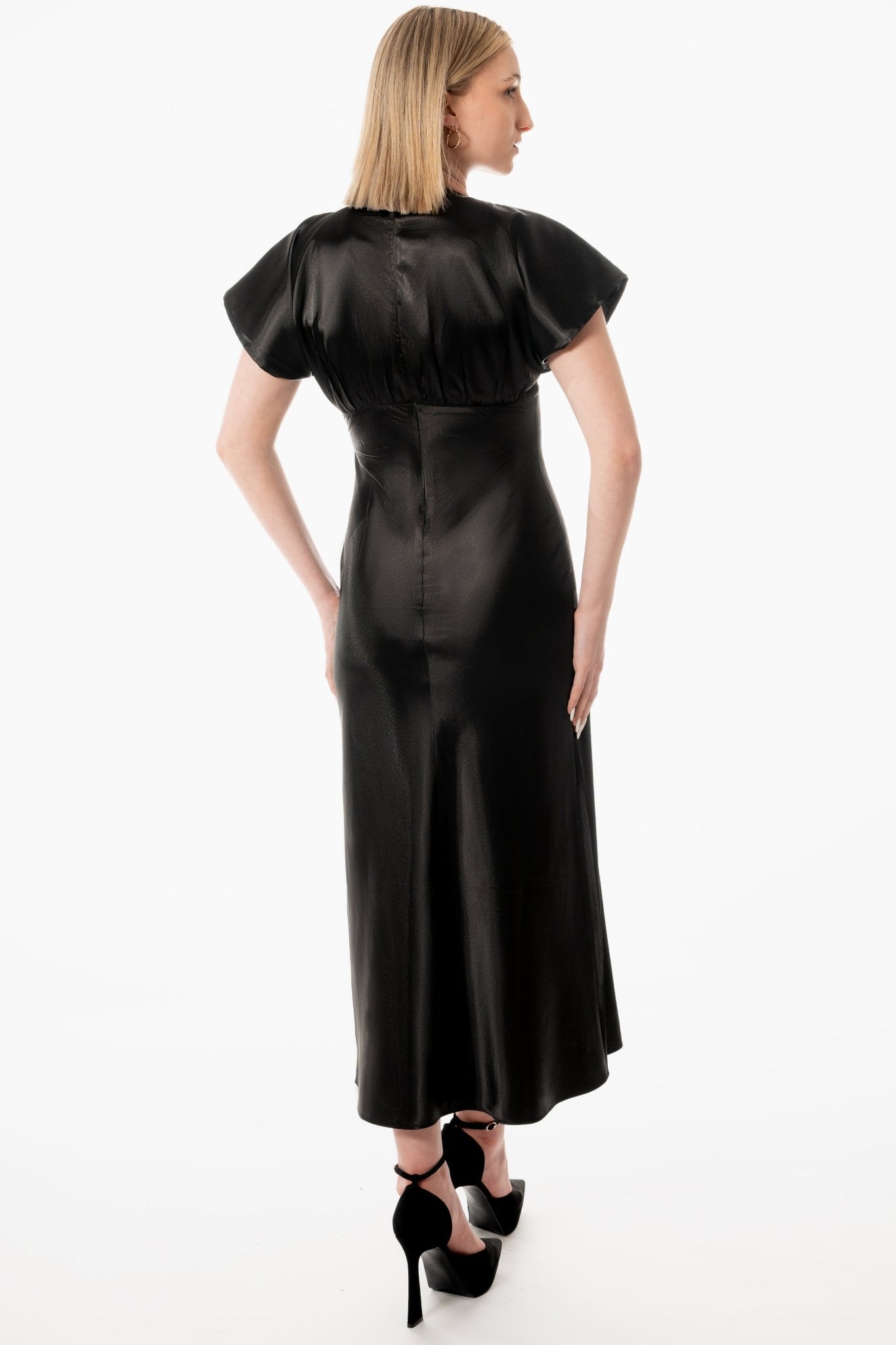 DIANA Hostess Dress Uniform for gaming, casino, hotel, restaurant, hospitality, and resorts. Satin black dress with short sleeves and bias skirt to the ankle. - KAPTVA Apparel